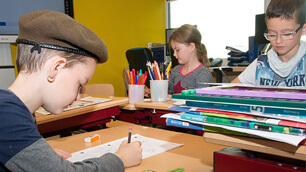 Drie kinderen aan tafel